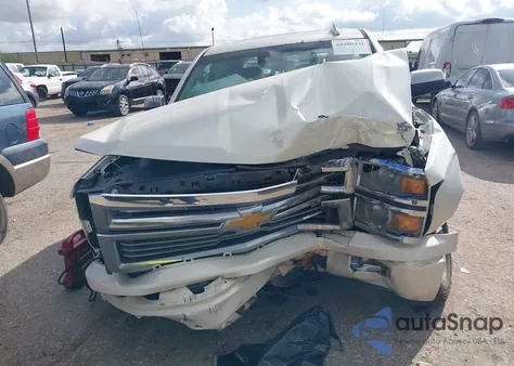 2015 Chevrolet Silverado 1500 High Country из США, поврежденный, VIN 3GCPCTECXFG161504